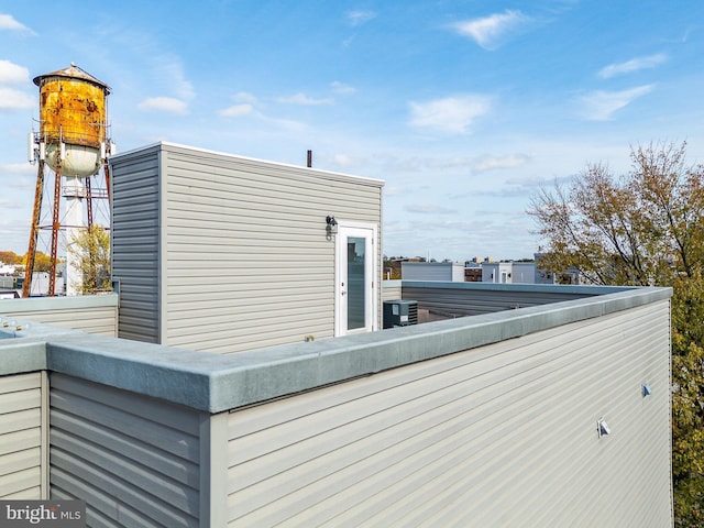 view of property exterior with a balcony