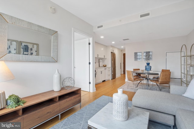 living room with light wood-type flooring