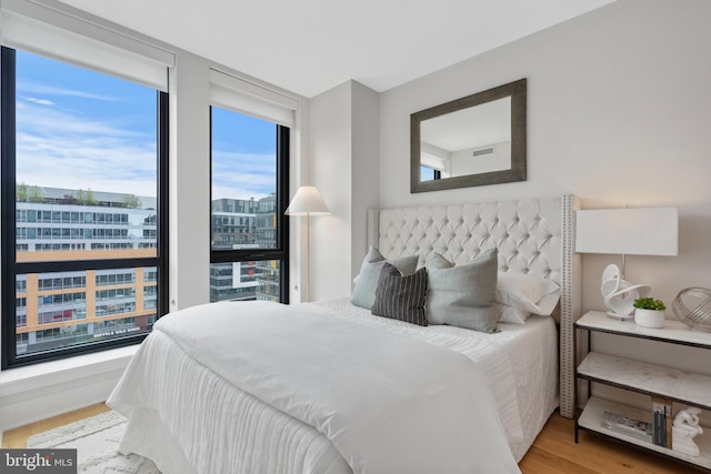 bedroom featuring hardwood / wood-style flooring