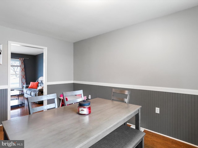 dining space featuring hardwood / wood-style floors