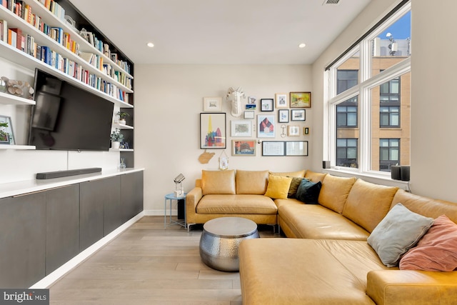 sitting room with light hardwood / wood-style floors