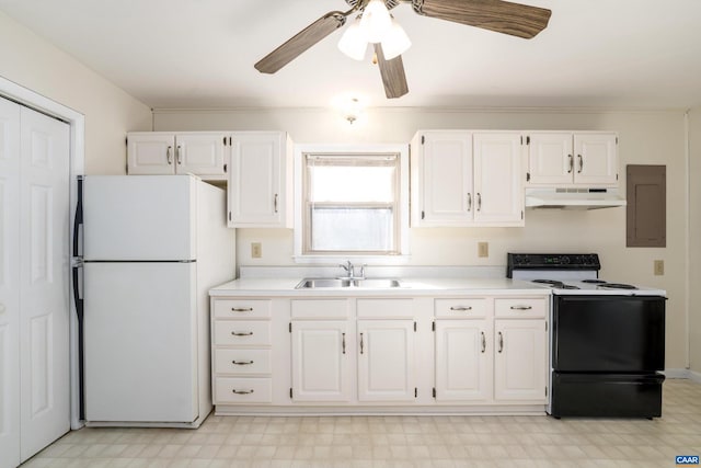 kitchen featuring electric stove, white cabinetry, sink, and white fridge