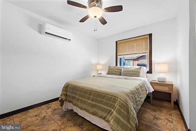 bedroom with an AC wall unit and ceiling fan