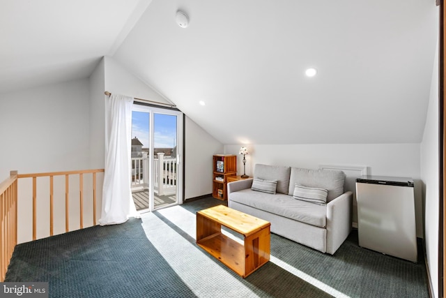 bonus room featuring carpet floors and vaulted ceiling