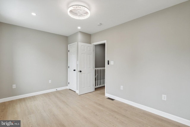 unfurnished bedroom featuring light hardwood / wood-style flooring