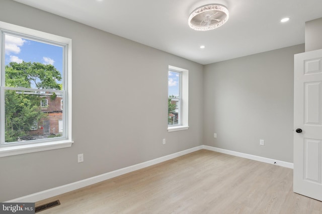 empty room featuring light hardwood / wood-style floors