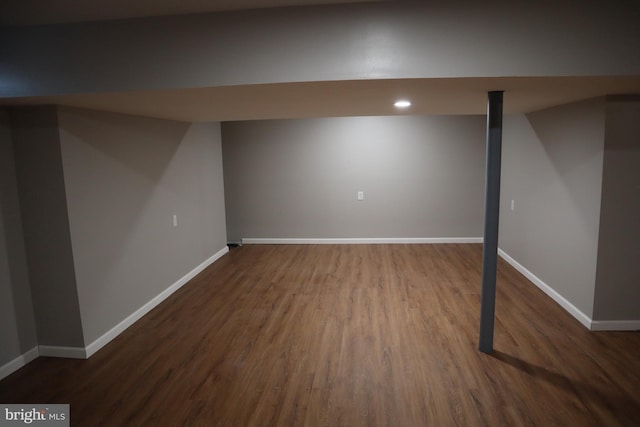 basement featuring dark wood-type flooring