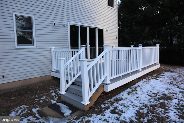 view of snow covered deck