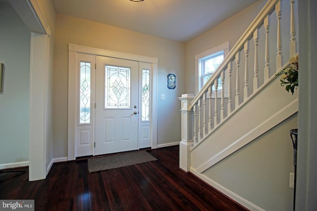 foyer with dark wood-type flooring