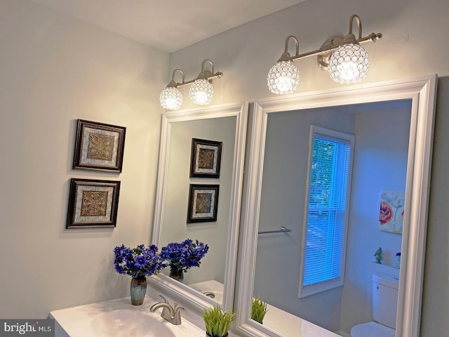 bathroom featuring sink and toilet