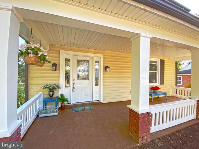 entrance to property with covered porch