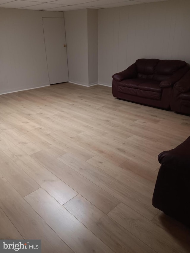 living room with light hardwood / wood-style flooring