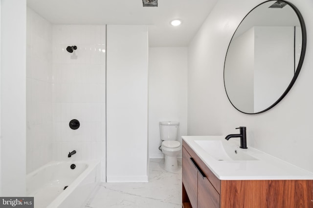 full bathroom featuring vanity, toilet, and tiled shower / bath