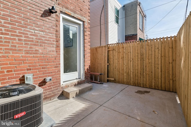 view of patio with central AC