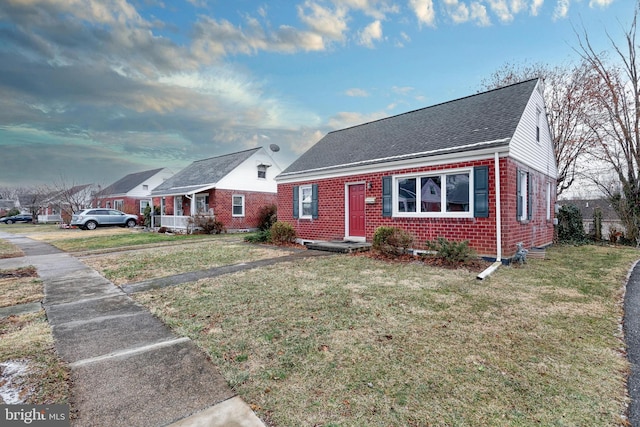 view of front of house with a front lawn