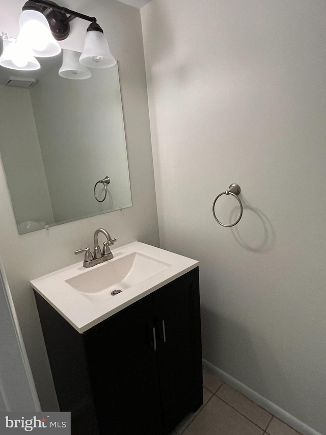 bathroom with vanity and tile patterned flooring