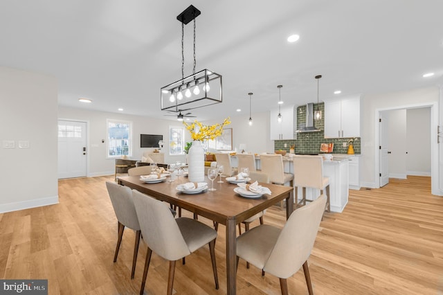 dining room with light wood-type flooring