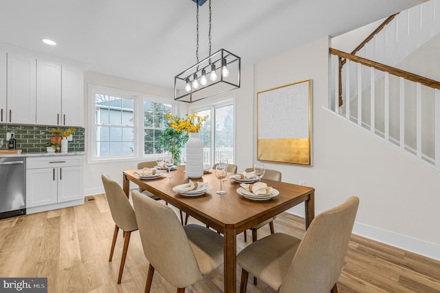 dining area with light wood-type flooring