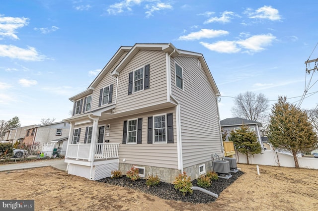 view of front of property featuring cooling unit