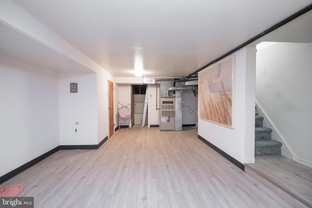 basement featuring light hardwood / wood-style floors