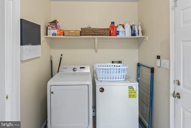 laundry area featuring independent washer and dryer