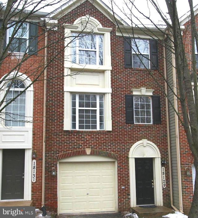 view of property with a garage