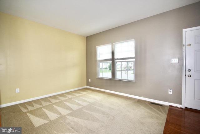 view of carpeted spare room