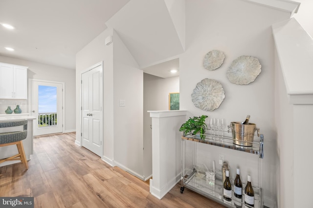 corridor featuring light hardwood / wood-style flooring