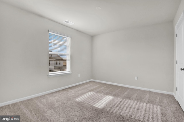 empty room with carpet floors