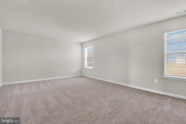 empty room with carpet floors