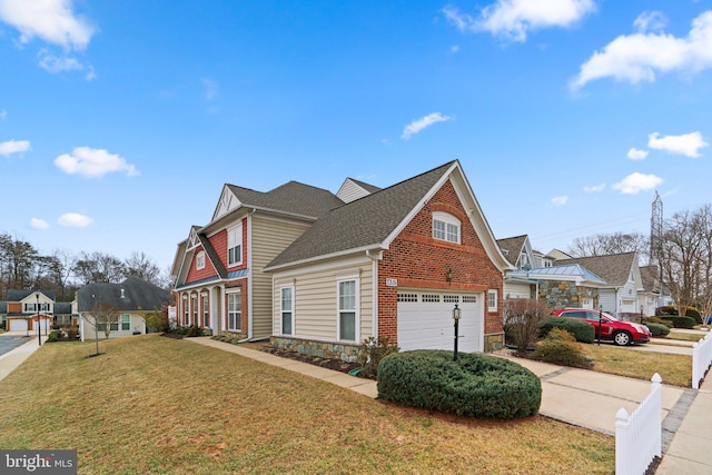 view of home's exterior with a yard, brick siding, fence, and a residential view