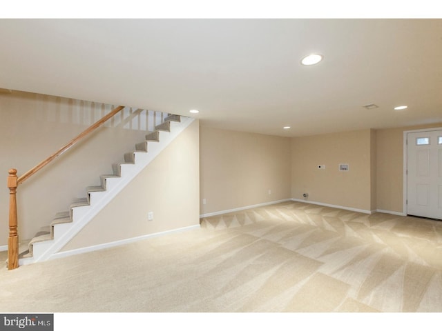 unfurnished living room with carpet