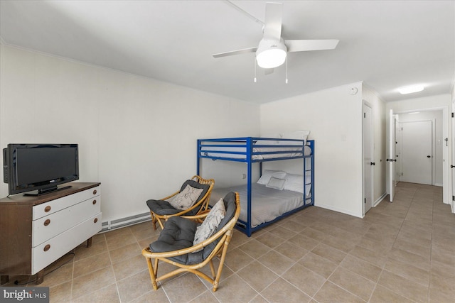 bedroom featuring ceiling fan, light tile patterned floors, and a baseboard heating unit