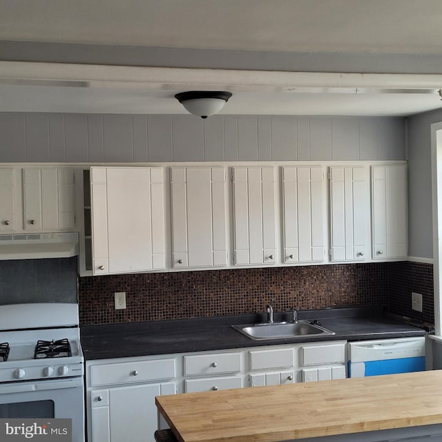 kitchen featuring white cabinetry, white appliances, sink, and butcher block countertops