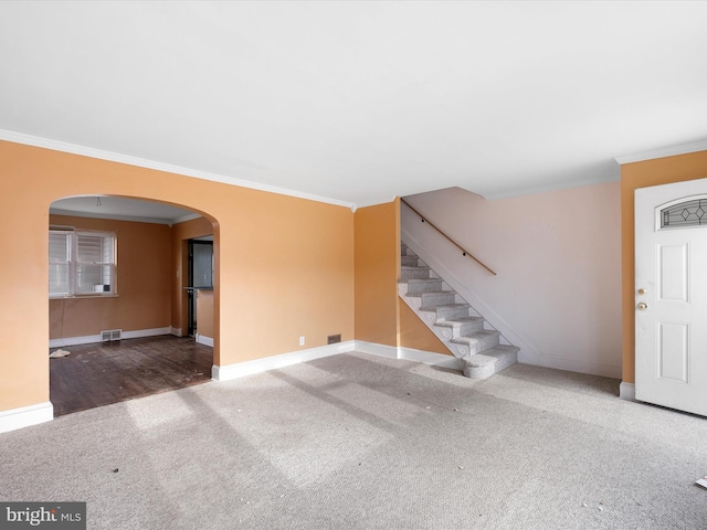 interior space with crown molding