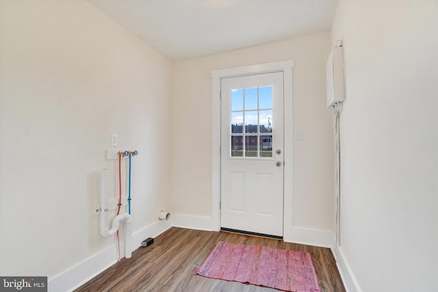 entryway with hardwood / wood-style floors