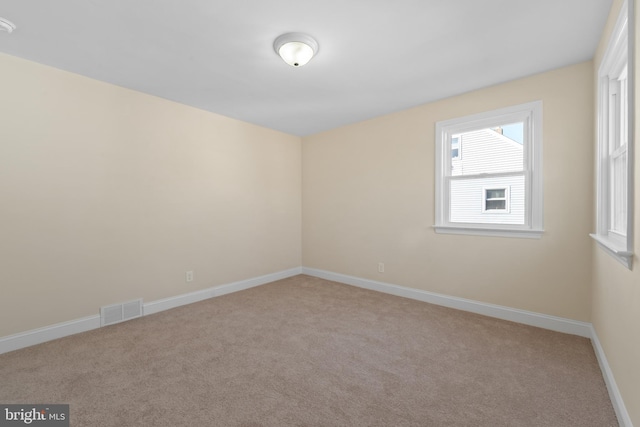 empty room with light carpet