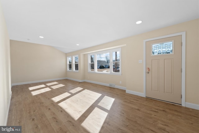 foyer entrance featuring light hardwood / wood-style flooring