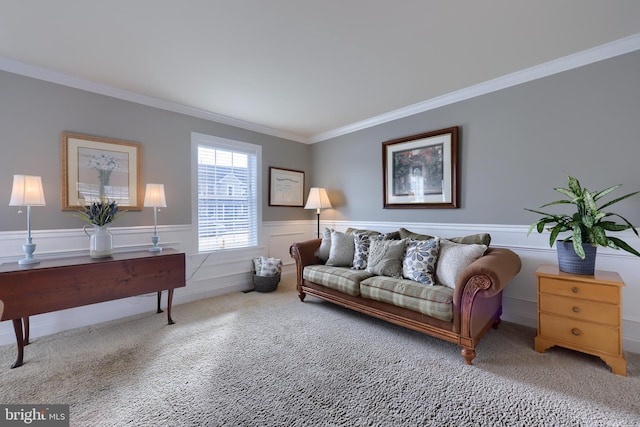 living room with ornamental molding and carpet