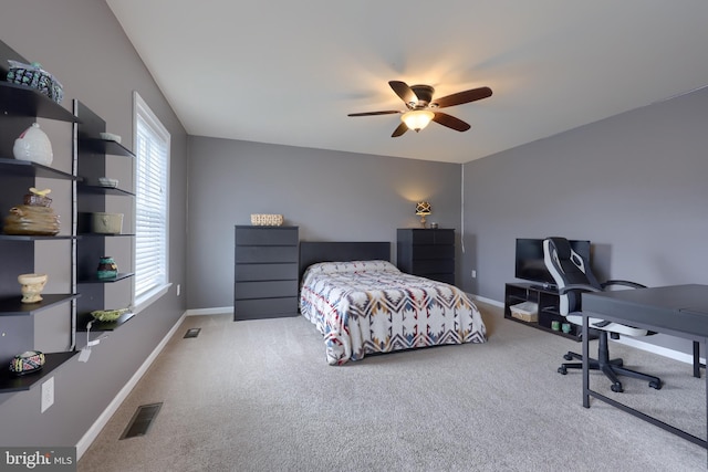 carpeted bedroom featuring ceiling fan