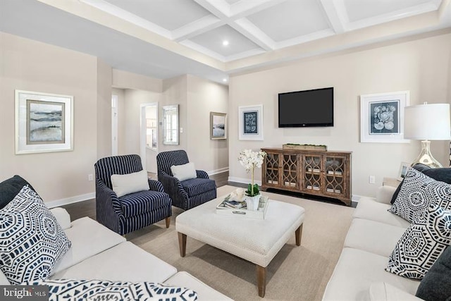 living room with beamed ceiling, coffered ceiling, and light hardwood / wood-style flooring