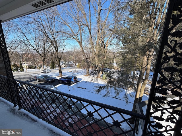 view of yard layered in snow