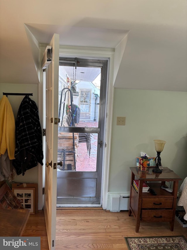 doorway with light hardwood / wood-style floors