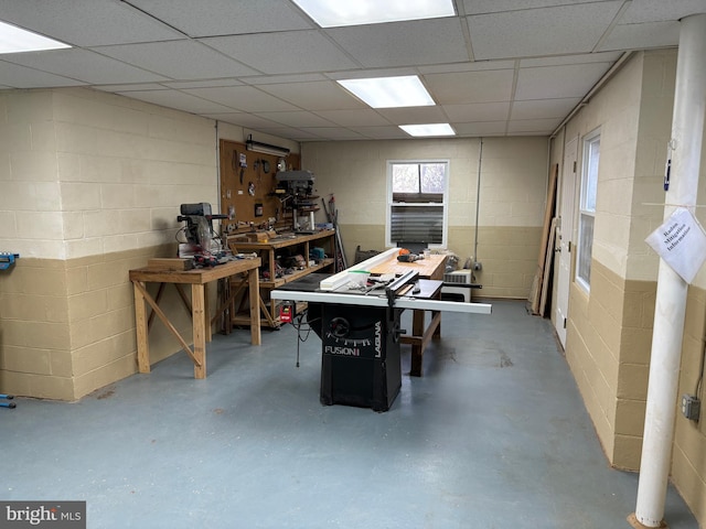 basement with a workshop area