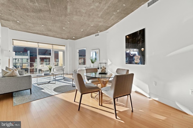 dining room featuring wood-type flooring