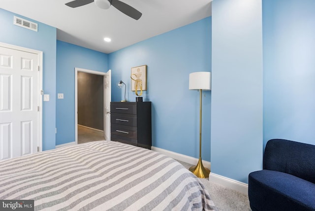 bedroom with ceiling fan and carpet