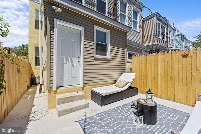 view of patio with cooling unit