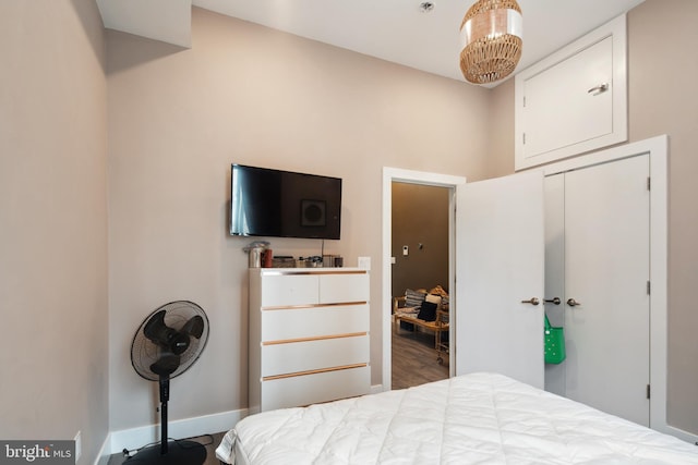 bedroom with a chandelier