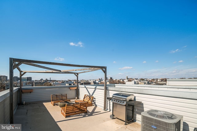 view of patio featuring a view of city, grilling area, a balcony, and central air condition unit