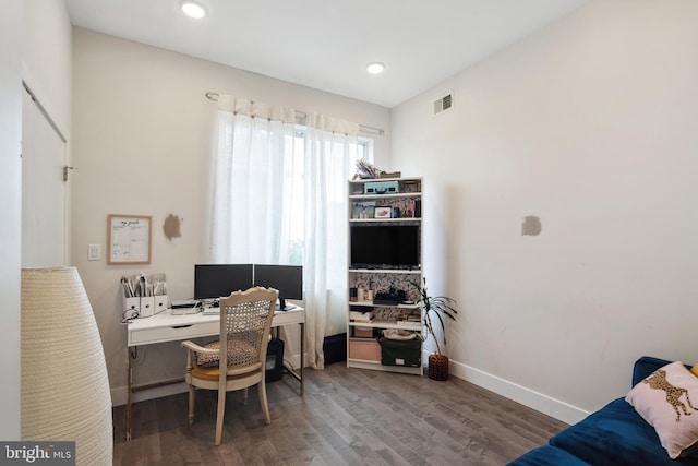 office featuring baseboards, visible vents, wood finished floors, and recessed lighting